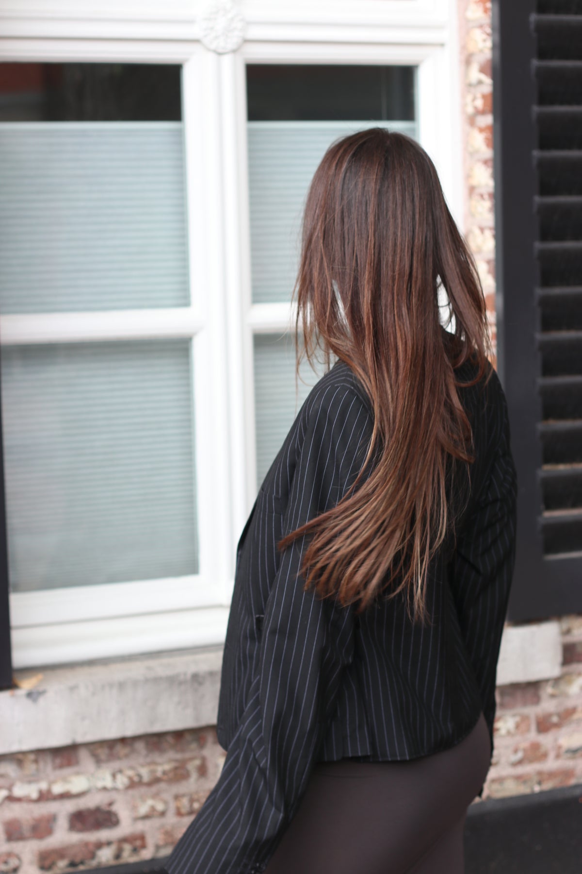 Black pinstripe blazer with buckles