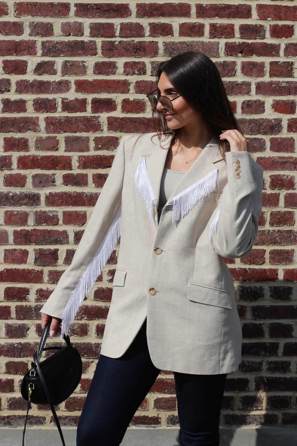 Beige blazer with fringe detail