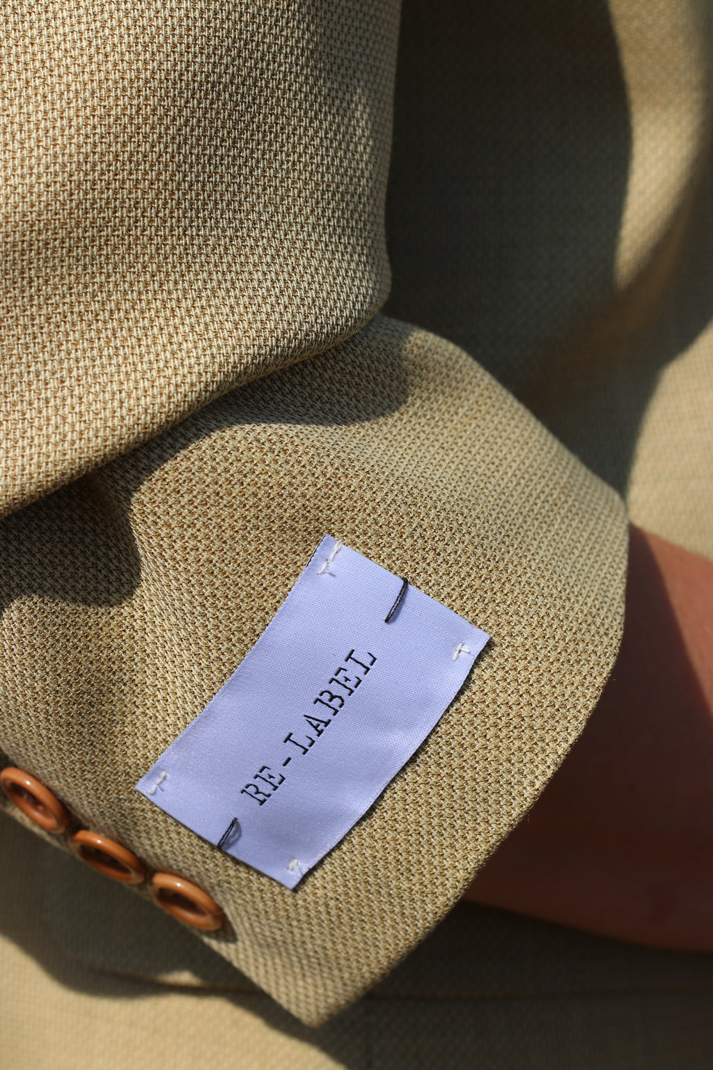 Light green blazer with elastic sleeves
