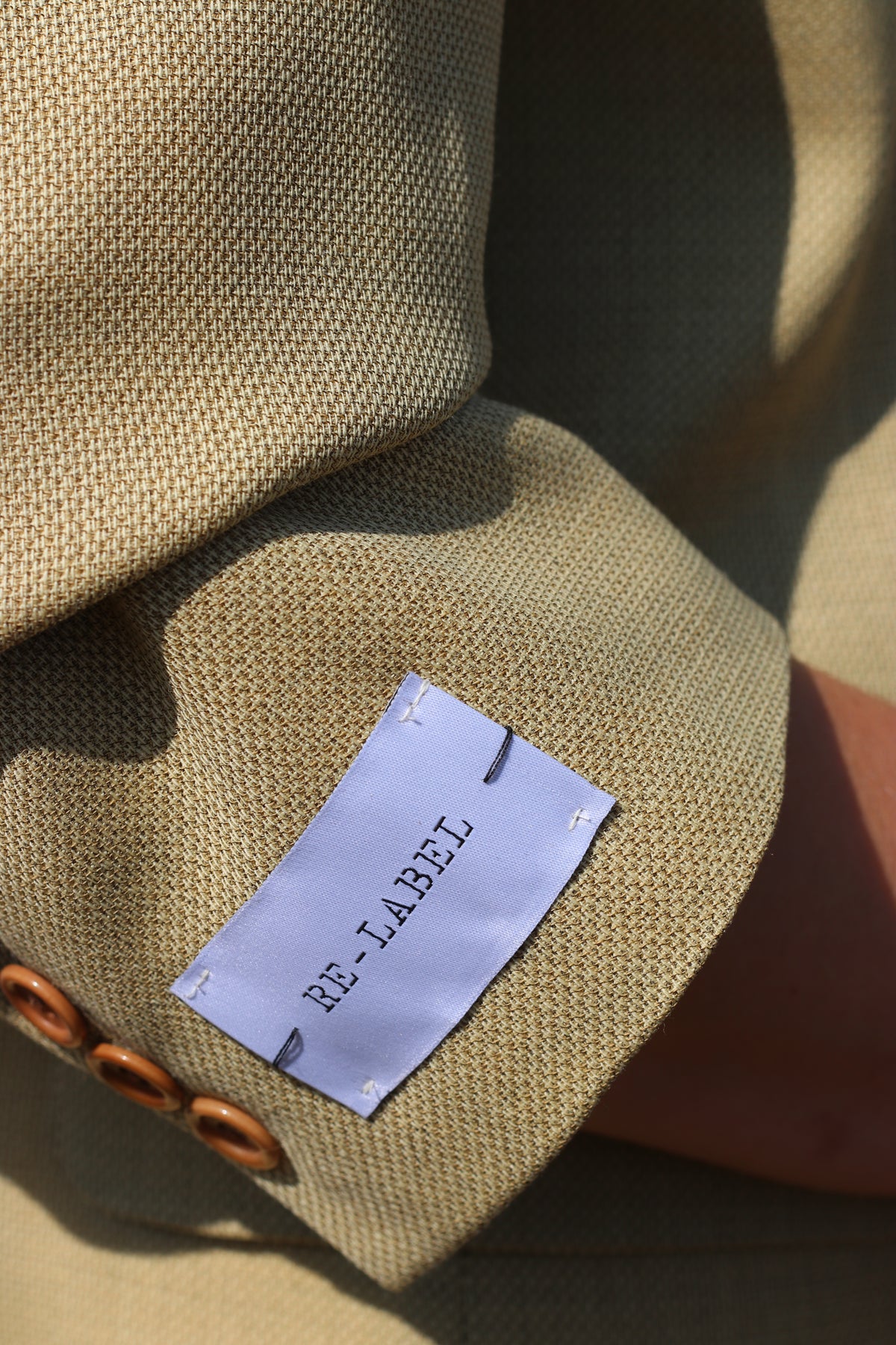 Light green blazer with elastic sleeves