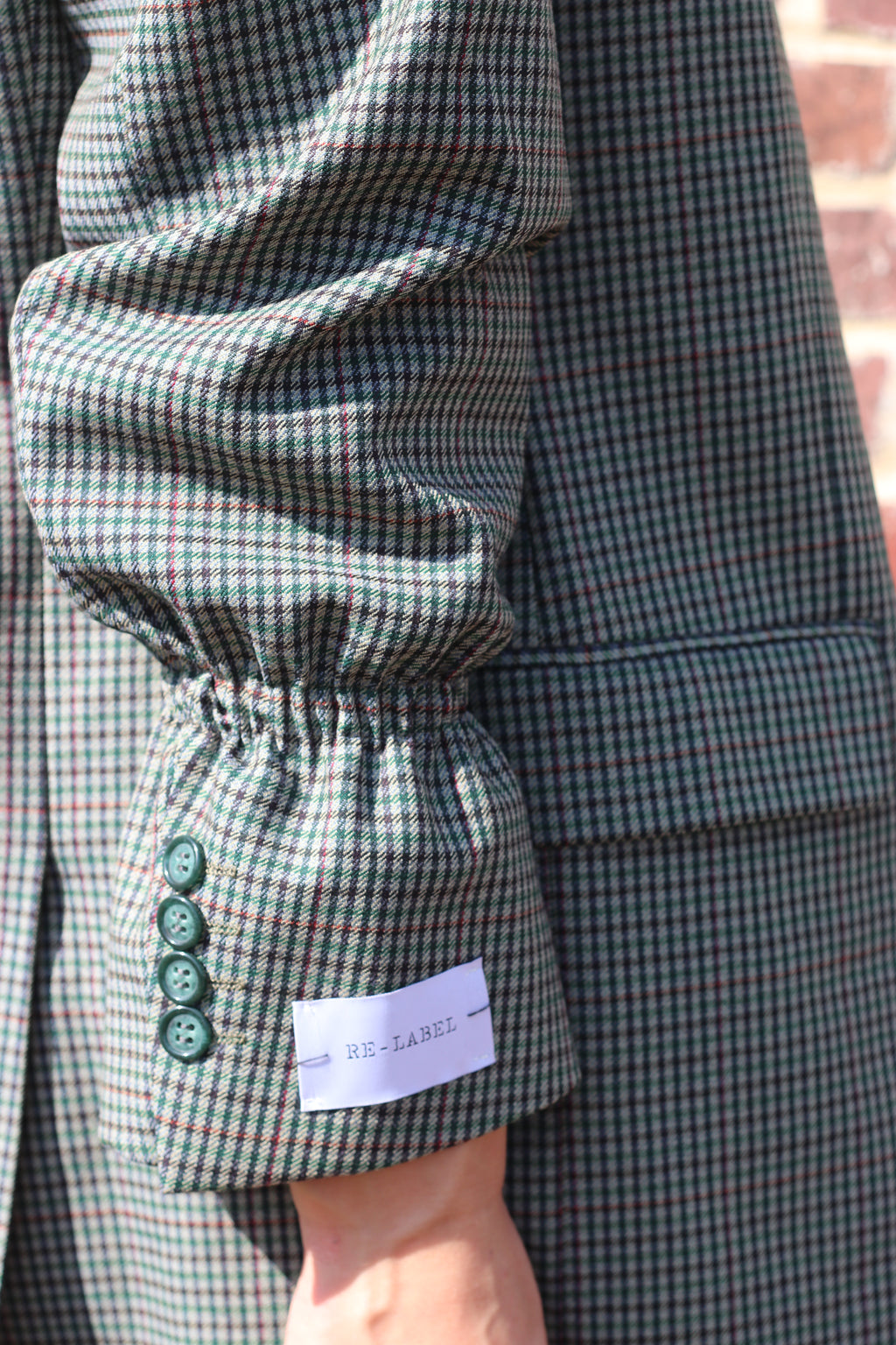 Green hounstooth blazer with elastic sleeves