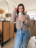 Beige checkered cropped blazer